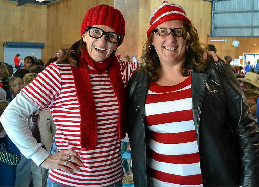 Warwick West teacher-librarian Sue Higgins (left) and teacher aide Heather Schiffman were “ring-in” Wallys during Book Week last week.